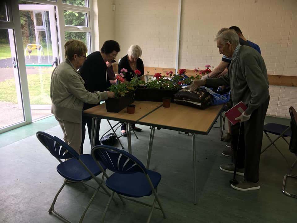 Planting flowers at The Ark